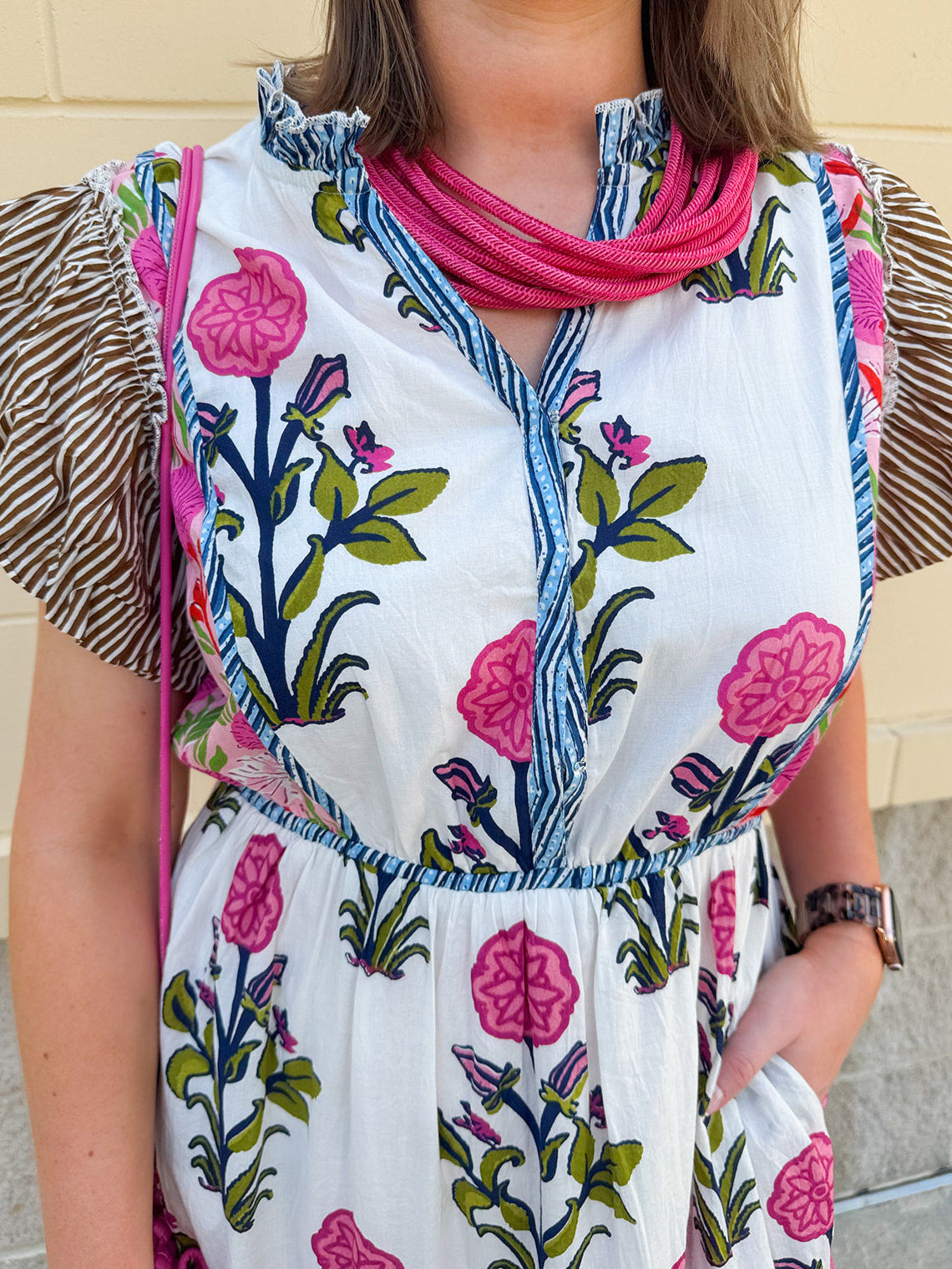 White cotton floral tiered maxi dress with flutter sleeves and ruffle collar
