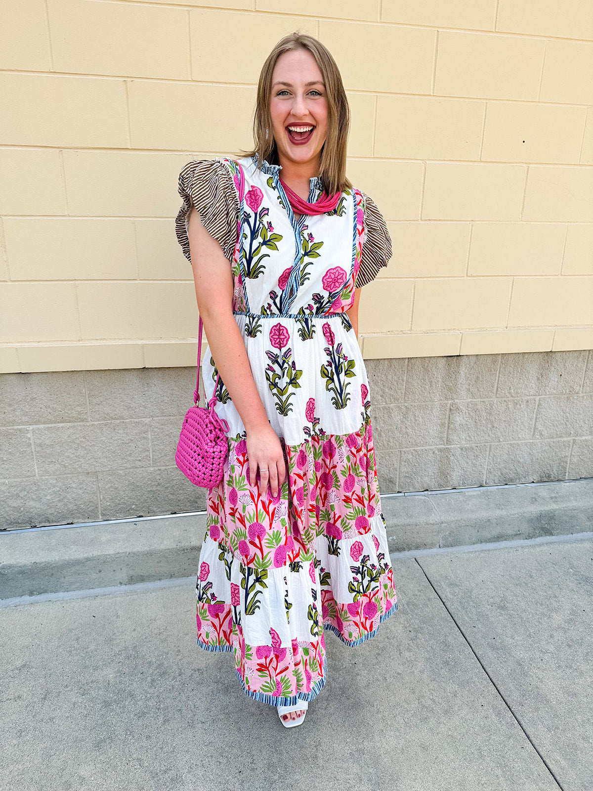 White cotton floral tiered maxi dress with flutter sleeves and ruffle collar
