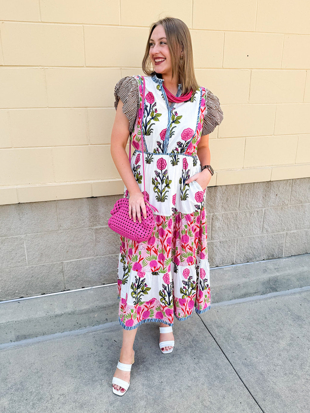 White cotton floral tiered maxi dress with flutter sleeves and ruffle collar