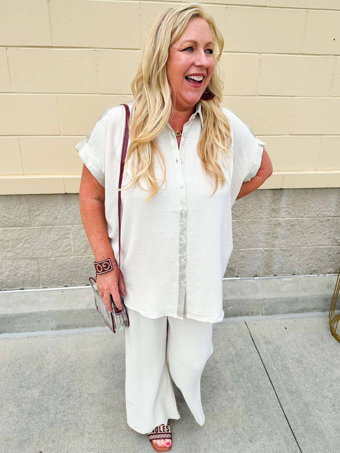 Oatmeal button-down top with gold trim, relaxed fit