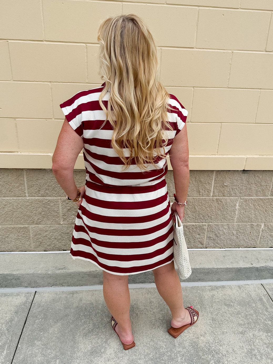 Garnet and cream striped zip-up mini dress with collar, drop sleeves, drawstring waist, and pockets—sporty and perfect for FSU gameday