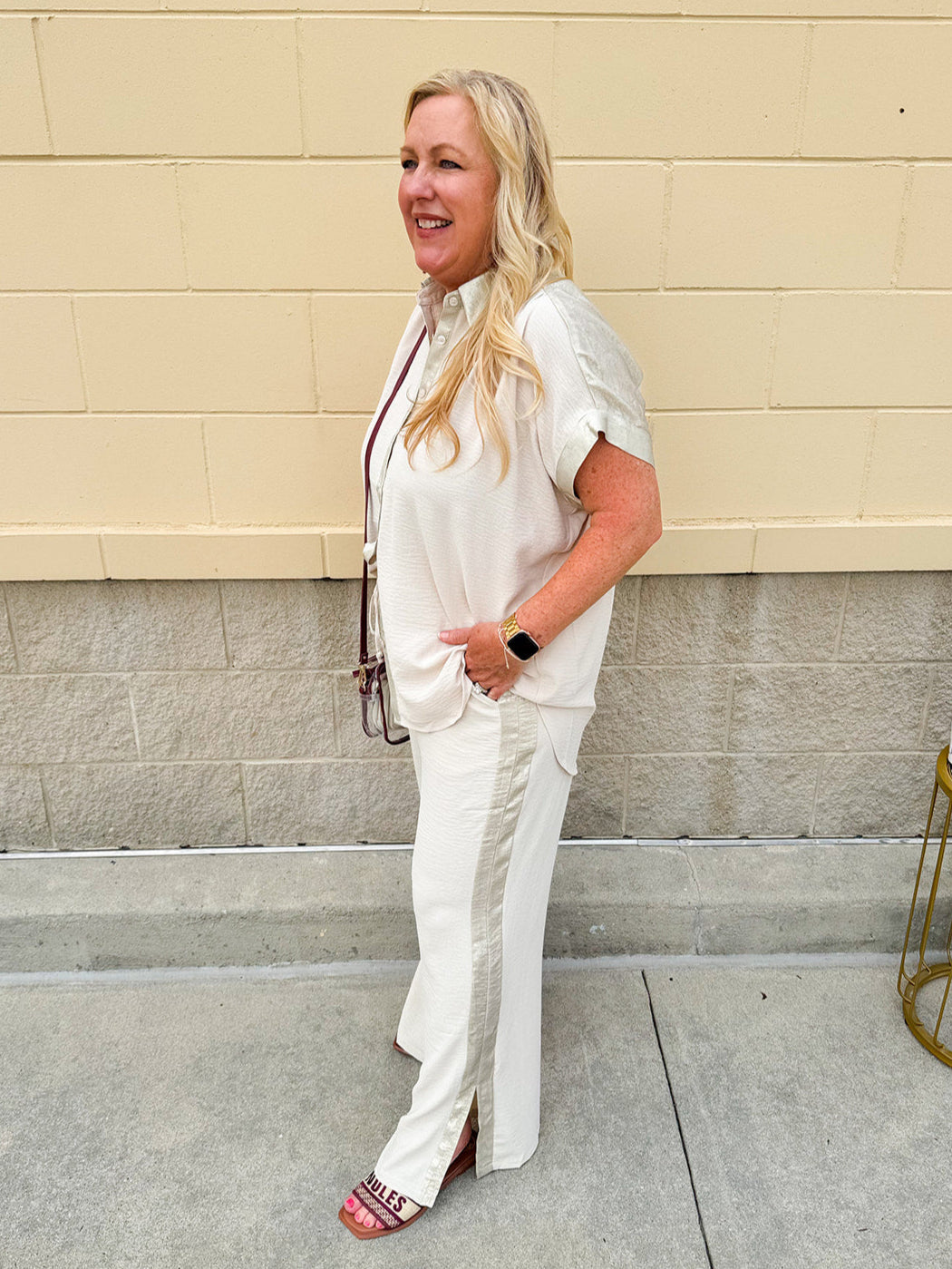 Oatmeal button-down top with gold trim, relaxed fit