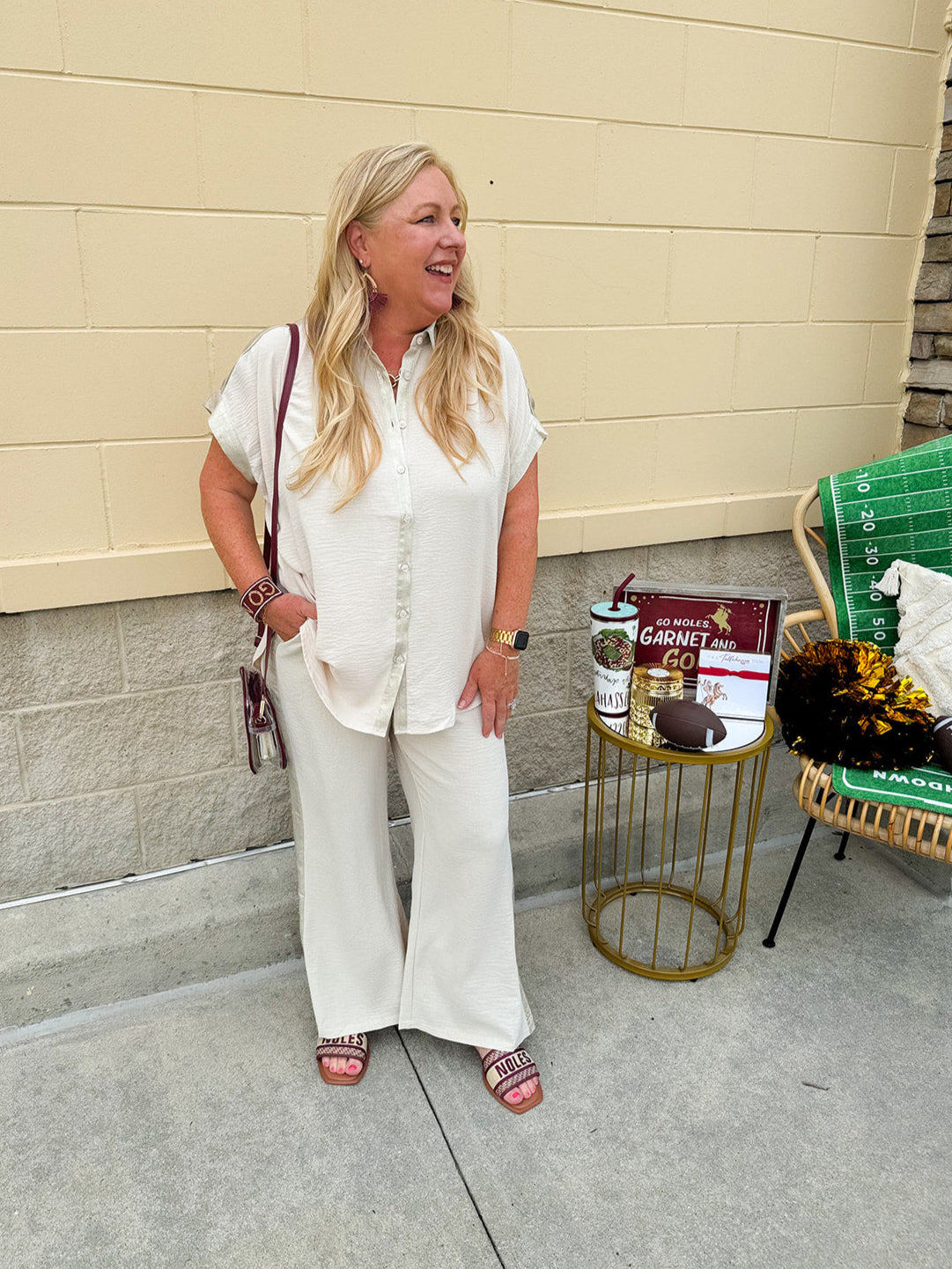 Oatmeal button-down top with gold trim, relaxed fit