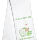 White kitchen towel featuring Topo Chico bottle, ranch water cocktail, and lime with “You’re the Topo Chico to My Ranch Water” text.