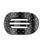 Black large flat round hair clip with a polka dot pattern.
