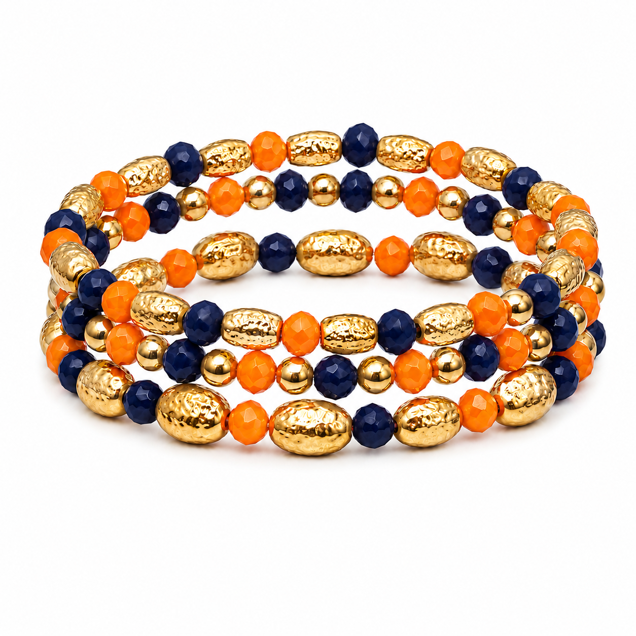 Multi-layer stretch bracelet stack with navy and orange faceted beads and hammered gold-tone accents