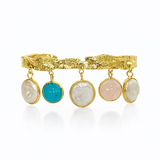 Gold cuff bracelet with cascading multi-colored stones