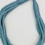 Dusty blue cotton rope necklace with layered strands, lightweight and breathable for all-season styling