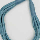 Dusty blue cotton rope necklace with layered strands, lightweight and breathable for all-season styling
