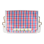 Clear stadium crossbody bag with red and blue gingham flap, white bamboo stick detail, white faux leather trim, and adjustable strap.