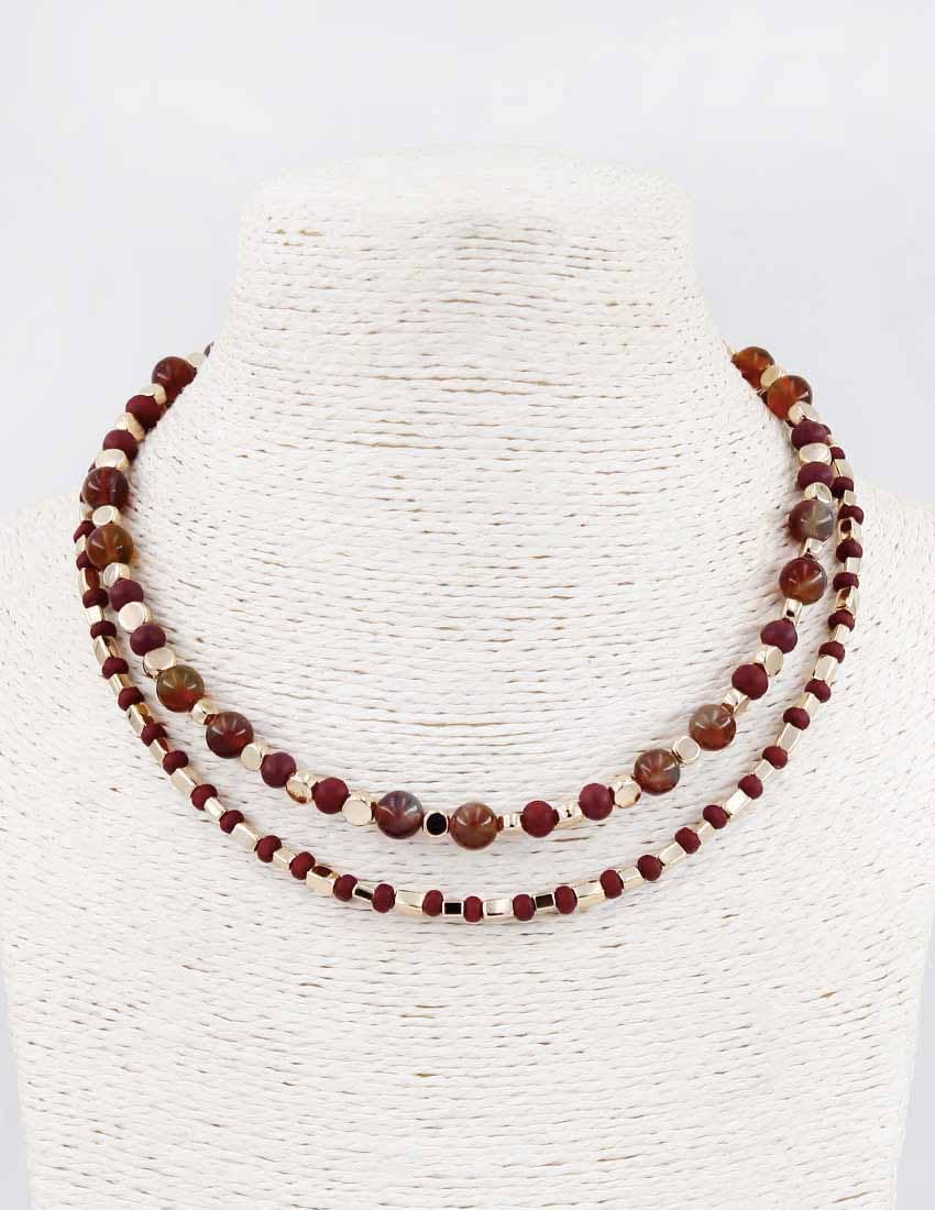 Two-layer beaded necklace with deep maroon, garnet, and cream beads