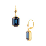 Blue emerald-cut crystal dangle earrings with iridescent crystal accents.