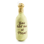 Festive Santa Muttgarita Pino Grrrigio plush dog toy shaped like a wine bottle.