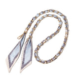 Baby blue and cream scarf woven through gold chain bag strap with clasps.