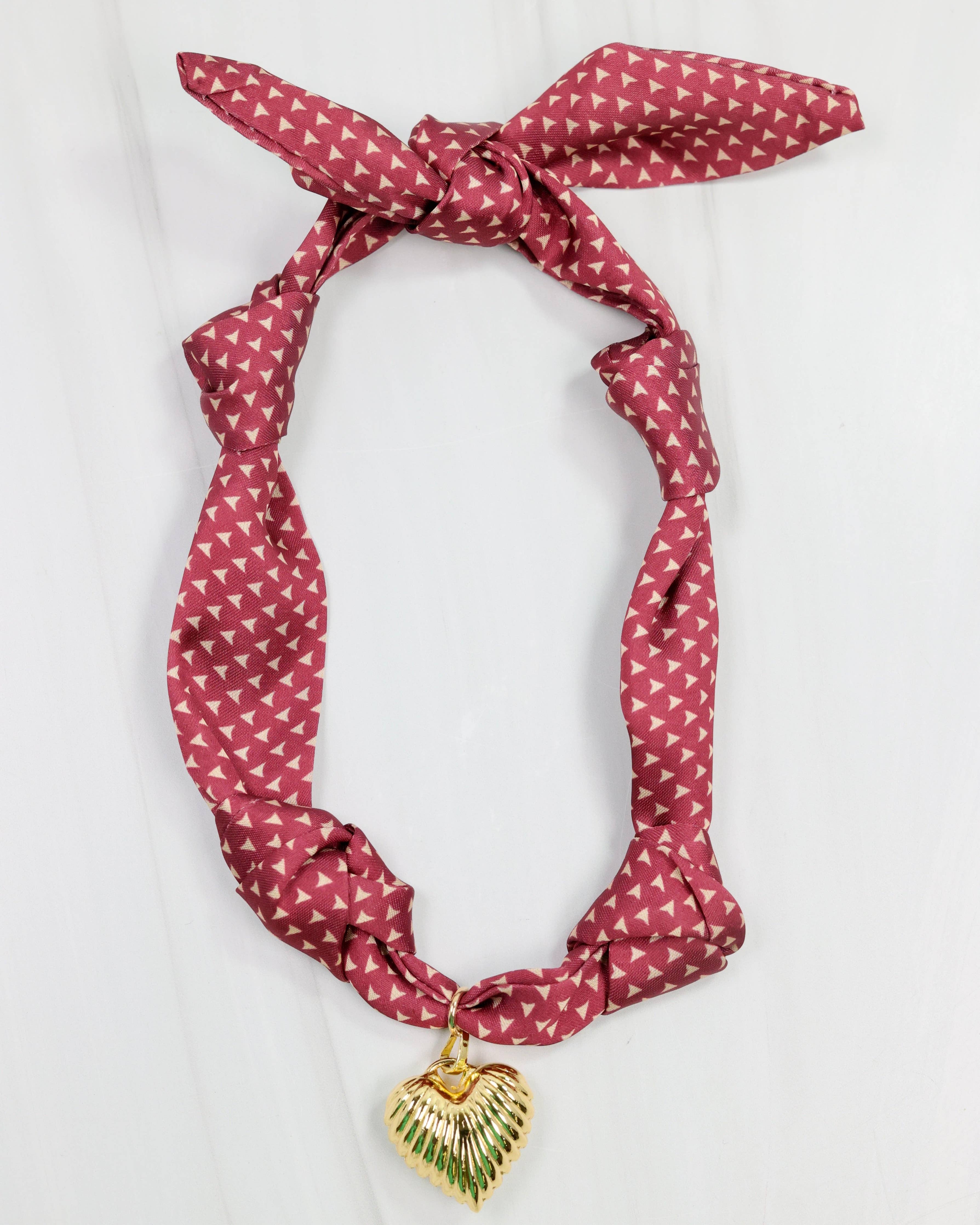 Garnet satin scarf necklace with gold micro-pattern and puff heart charm pendant