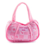 Pink checker plush handbag-shaped dog toy with a squeaker.