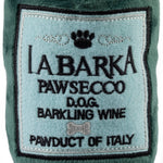 Plush Pawsecco bottle-shaped dog toy with a narrow neck and hidden squeaker.