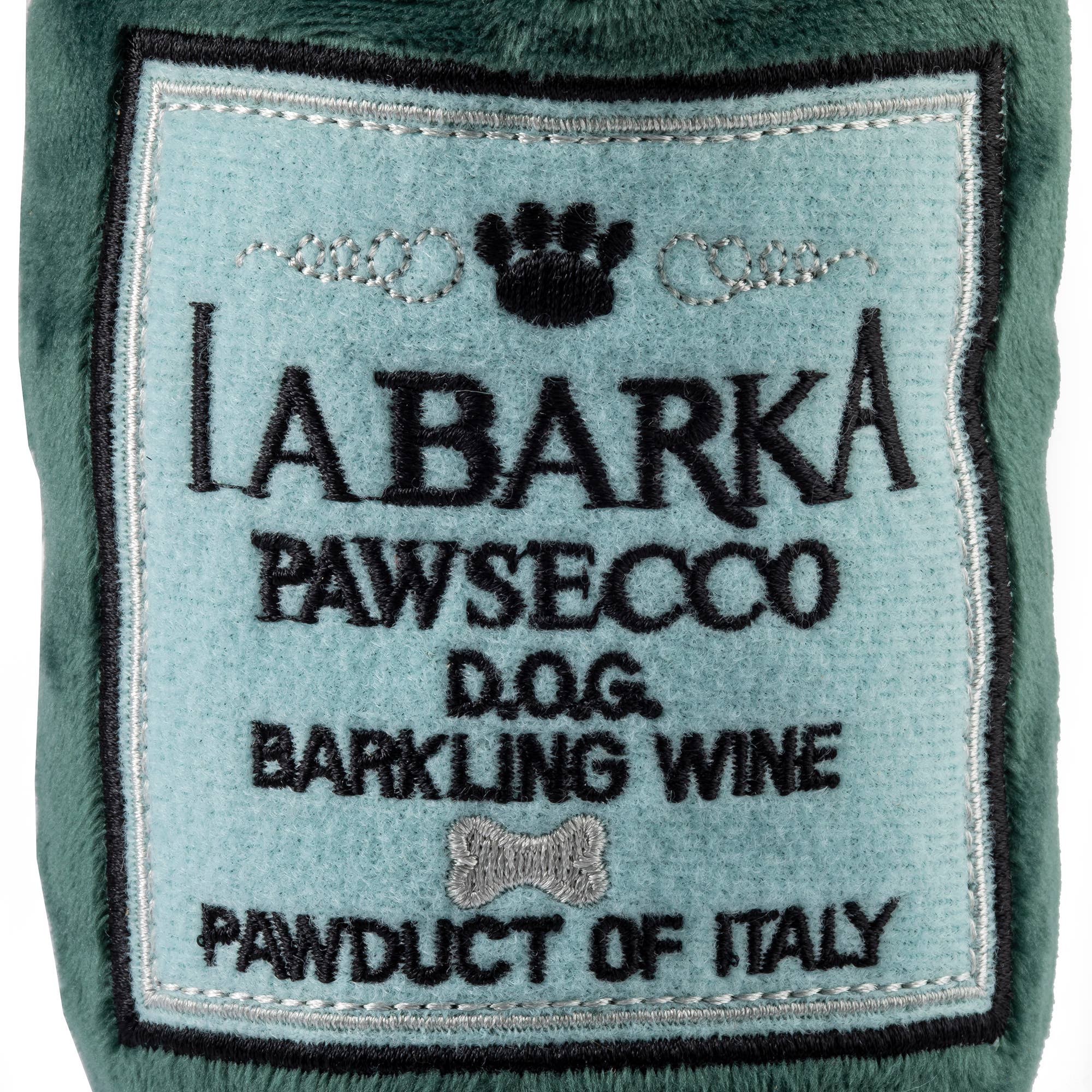 Plush Pawsecco bottle-shaped dog toy with a narrow neck and hidden squeaker.