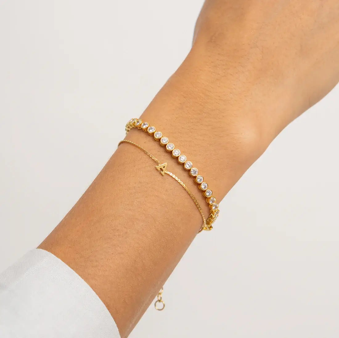 Dainty 18K gold initial bracelet with adjustable chain