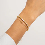 Dainty 18K gold initial bracelet with adjustable chain