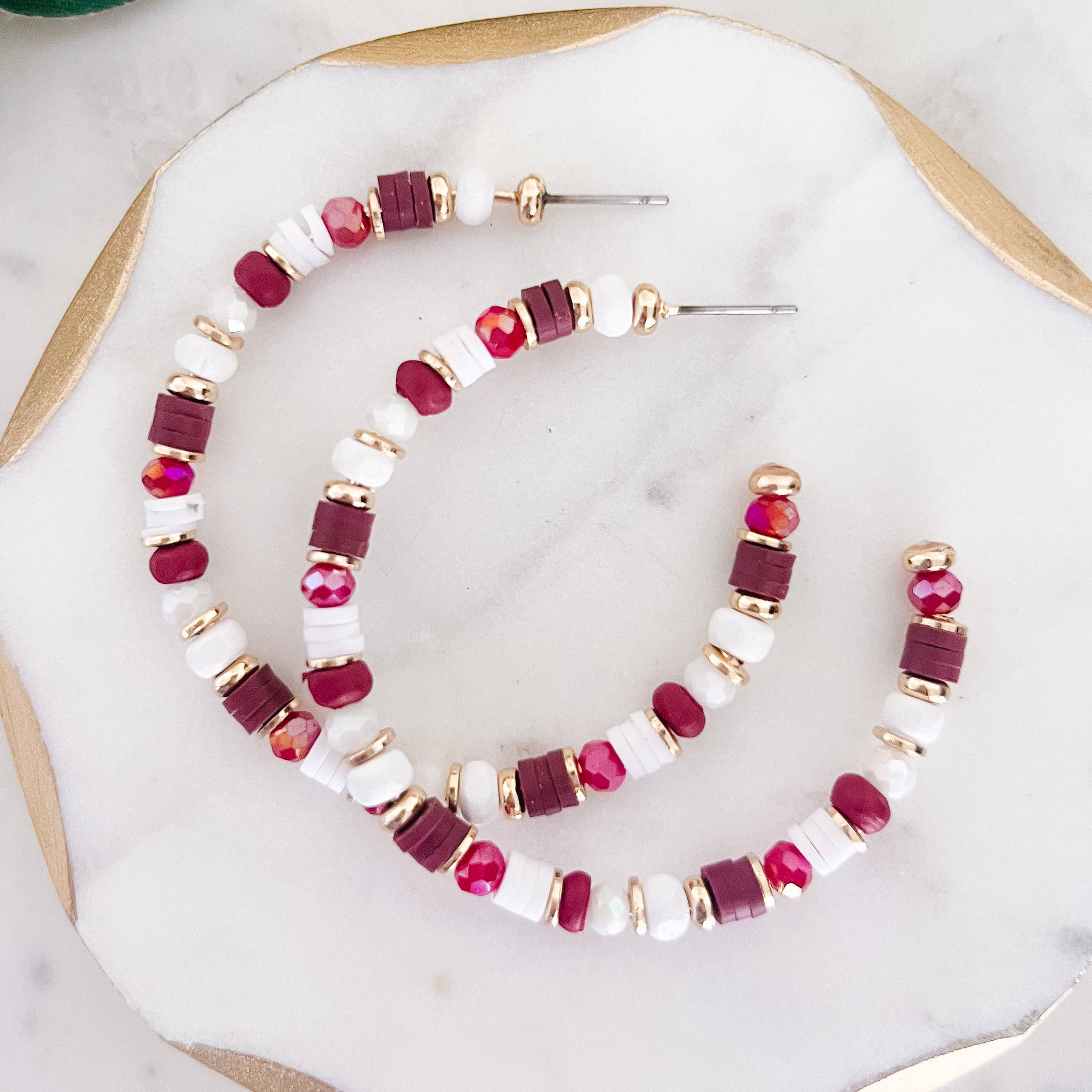 Hoop earrings with garnet and white rubber discs and glass beads
