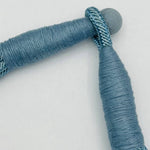 Dusty blue cotton rope necklace with layered strands, lightweight and breathable for all-season styling