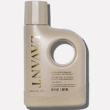 L'AVANT Ambre Santal Laundry Detergent in a recycled plastic bottle featuring a concentrated plant-based formula for laundry care.