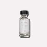 L'AVANT Ambre Santal Multipurpose Surface Cleaner Refill concentrate in a glass bottle for creating reusable cleaning spray.
