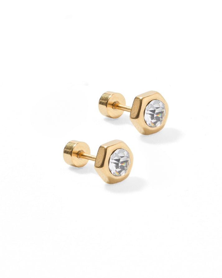  Addison Clear Stone Stud Earrings featuring 8mm gold hexagon studs with a clear CZ stone center