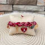 Alabama Crimson Tide adjustable bandana charm bracelet featuring a bandana-style fabric band with gold Alabama-themed charms including the Alabama A, elephant, heart, script, and coin charms.