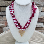Alabama Crimson Tide scarf necklace featuring a silky white and crimson checkerboard scarf with a polished gold elephant charm.