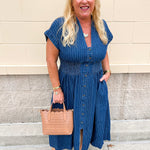Denim midi dress with button front and smocked waist