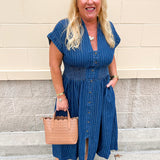 Denim midi dress with button front and smocked waist