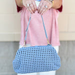 Light blue braided weave clutch handbag with removable strap and spacious interior