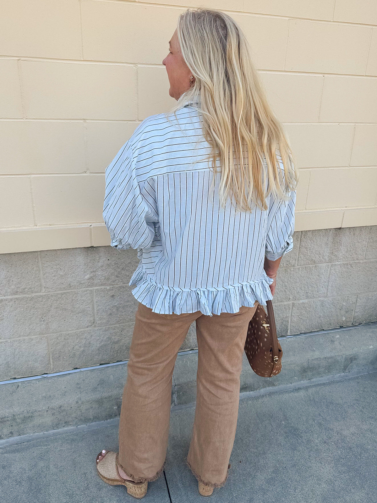 Blue Ribbon baby blue pinstripe button-down top with ruffle hem and front pocket