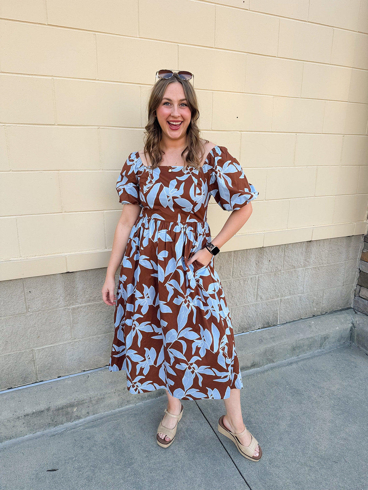 Bluebell Grove brown dress with light blue leaf pattern and short sleeves
