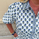 Navy floral dress with puff sleeves, button-down front, and collar