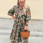 Olive boho print tiered midi dress with V-neck collar and 3/4 elastic sleeves.
