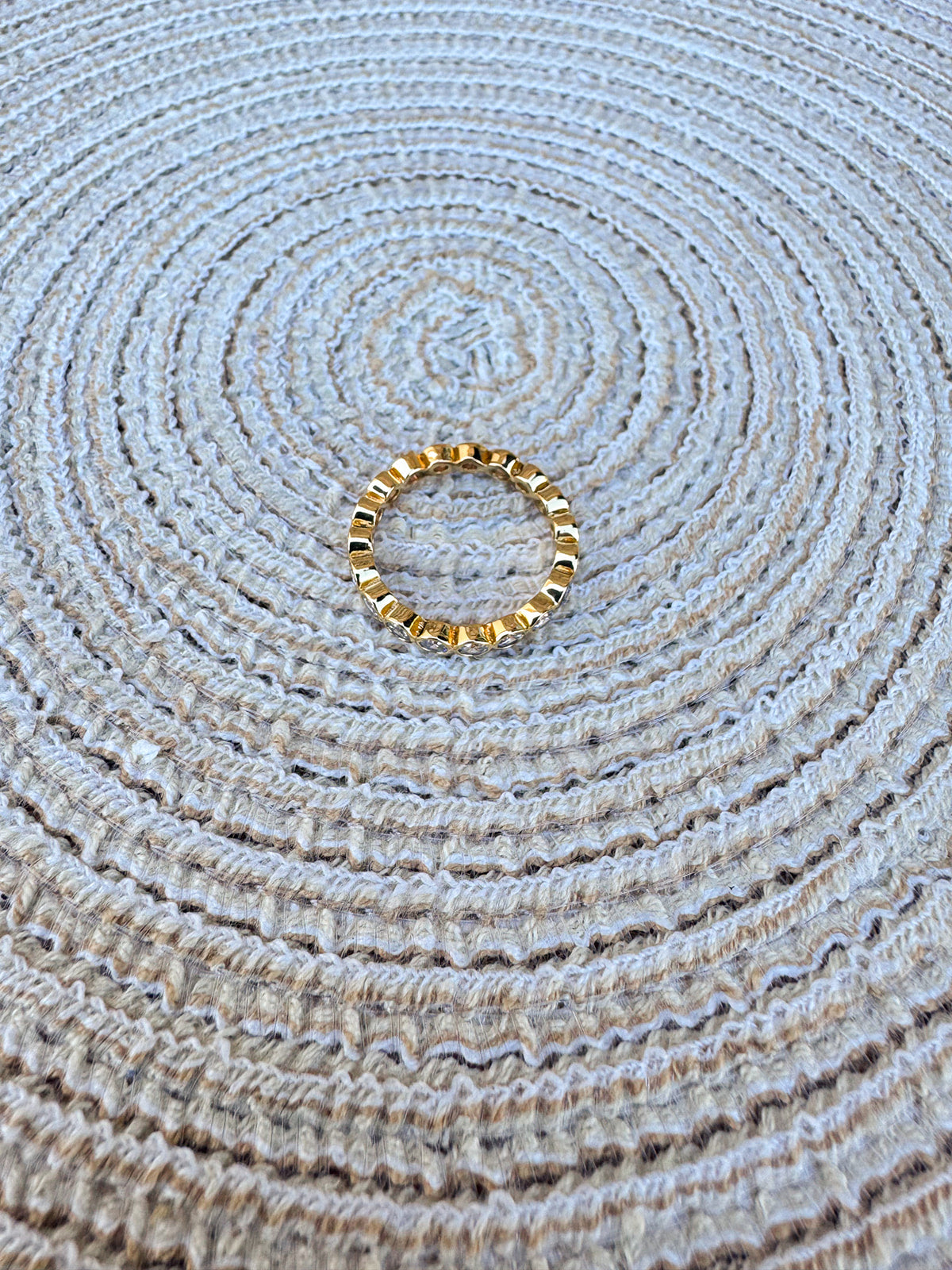 Gold tennis ring with cubic zirconia