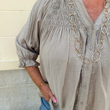 Café Season light brown long sleeve button-down blouse with ruffle collar and cuffs