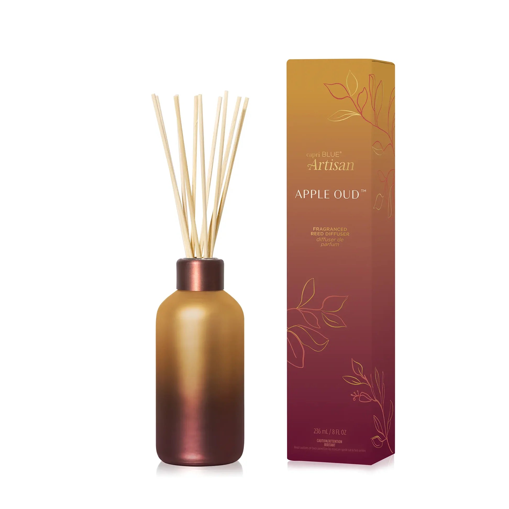 Apple Oud Tuscan Radiance Reed Diffuser in burgundy gild ombre glass bottle
