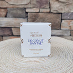 Coconut Santal Terrazza Velluto tumbler candle with gold lid in a gift box.