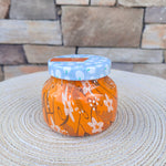 Pumpkin Dulce 8oz petite jar candle with festive Holiday Pattern Play design.