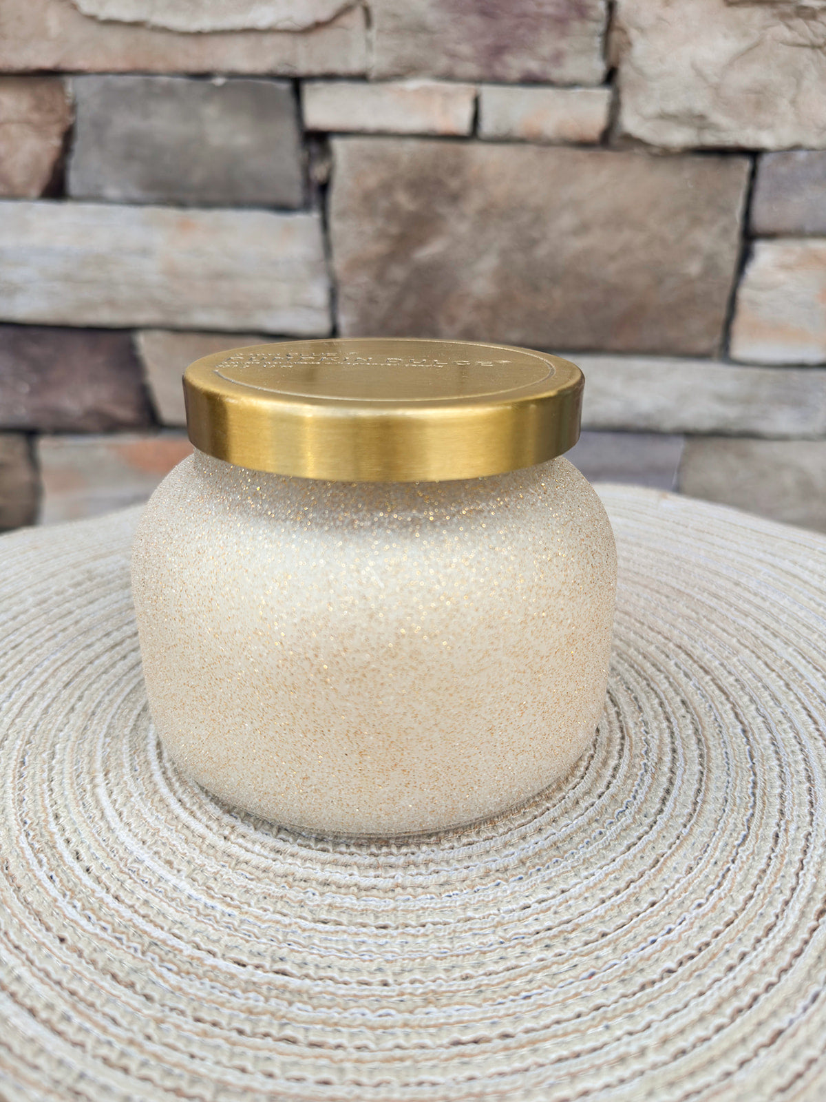 Pumpkin Dulce 19oz Glam Signature Candle in a decorative vessel.