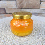 Pumpkin Dulce 8oz Glimmer petite jar candle with shimmering seasonal design.