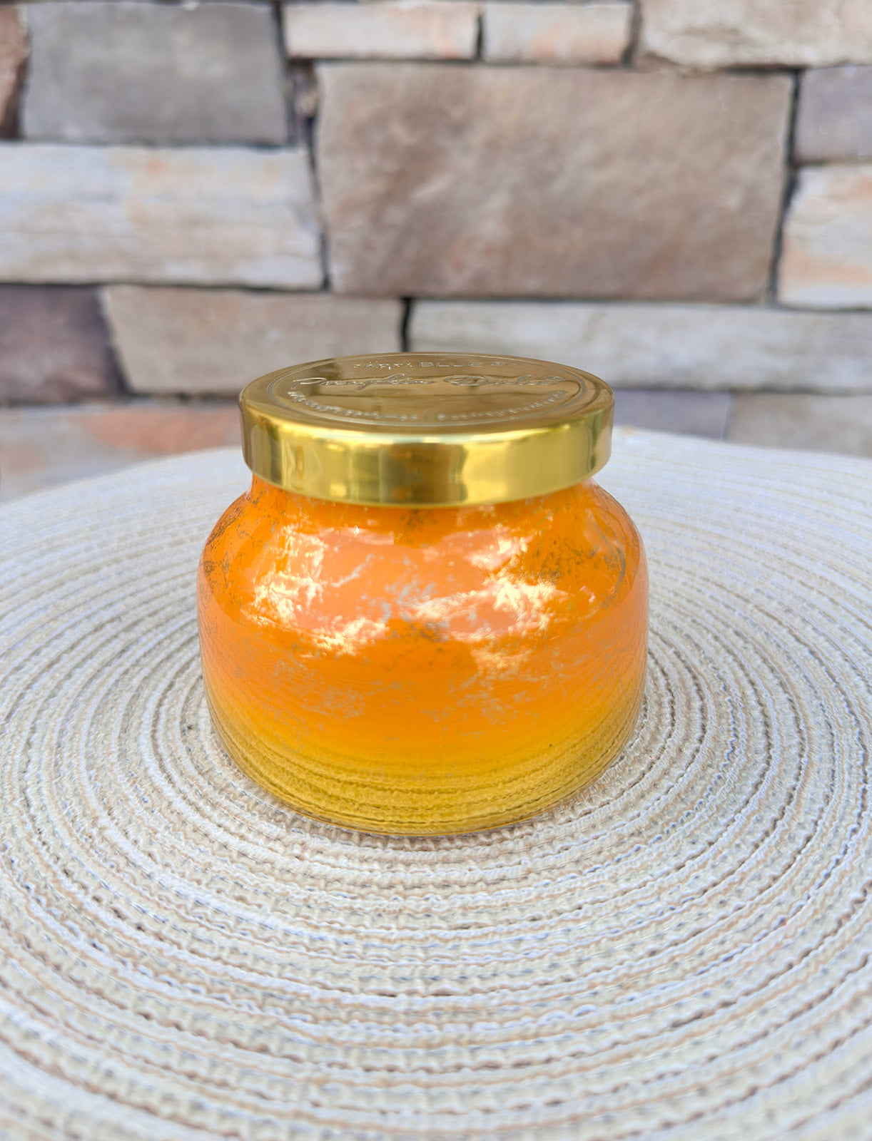 Pumpkin Dulce 8oz Glimmer petite jar candle with shimmering seasonal design.