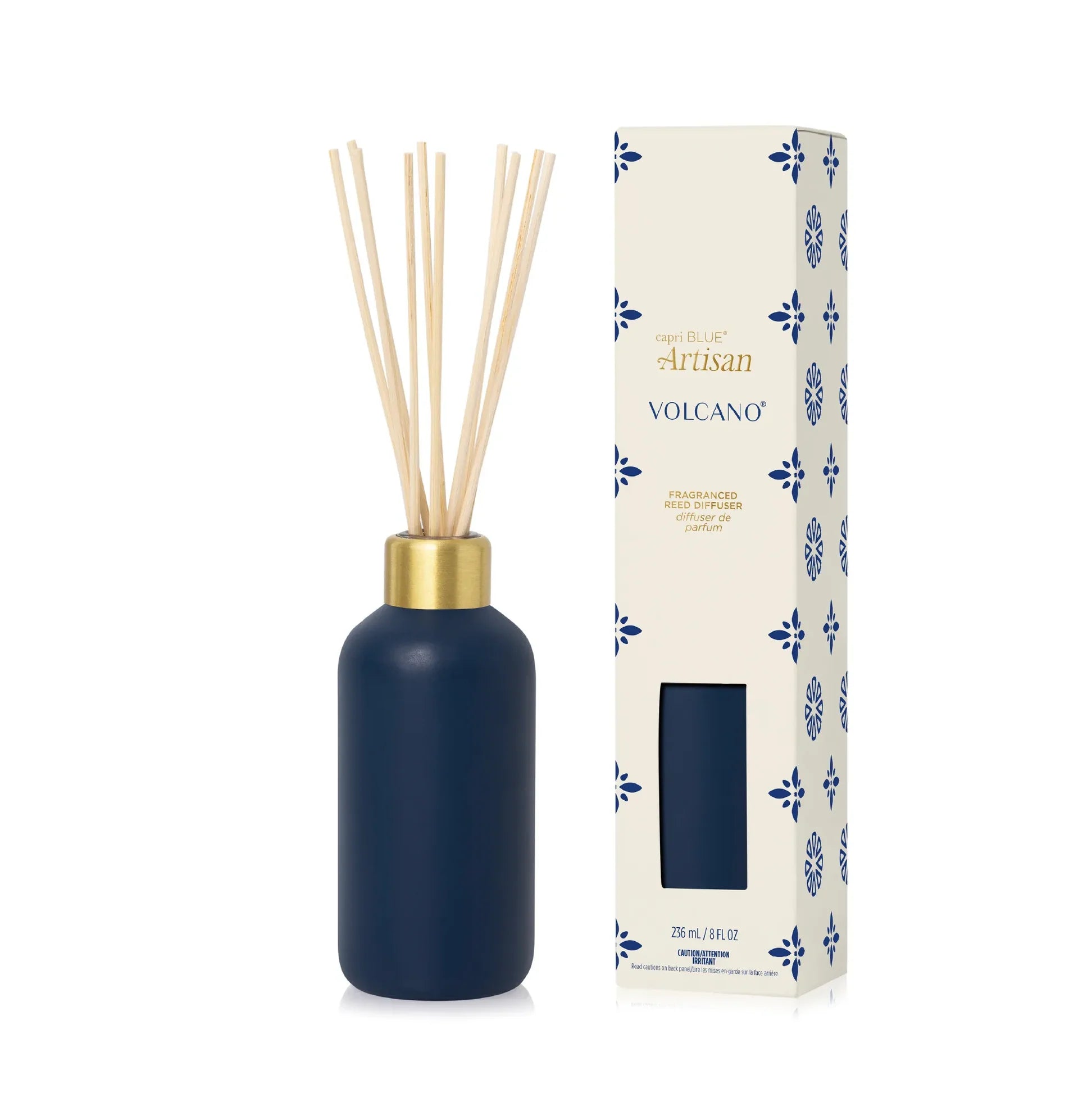 Matte midnight glass reed diffuser with gold collar and patterned carton