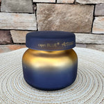 Volcano Tuscan Radiance petite scented candle in a decorative vessel.