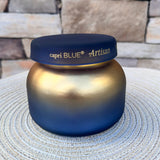 Volcano Tuscan Radiance scented candle in an elegant decorative vessel.
