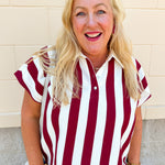 Off-white and garnet striped knit top with collared neckline and relaxed drop short sleeves.